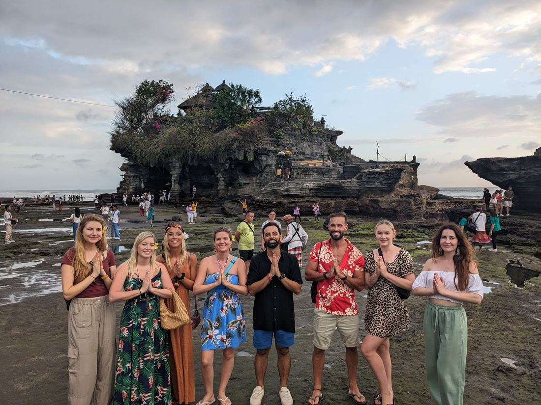 Work Wanderers group at Tanah Lot temple in Bali