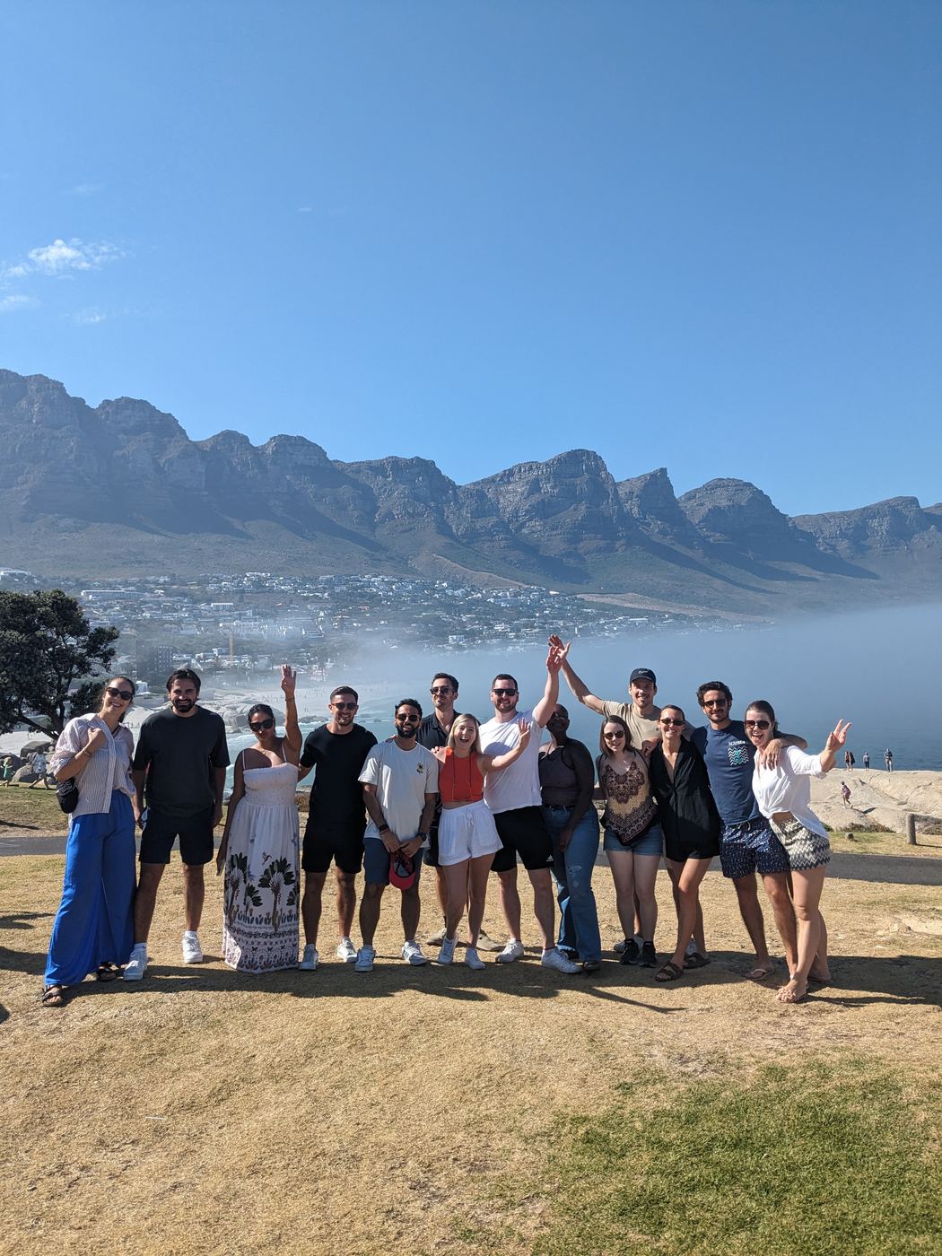 Cape Town Nomads on a hike with Camps Bay and the Twelve Apostles behind them